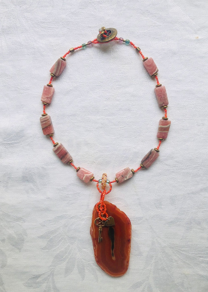 Orange Stone Slice with Charms and Rhodonite Necklace-SugarJewlz Handmade Jewelry