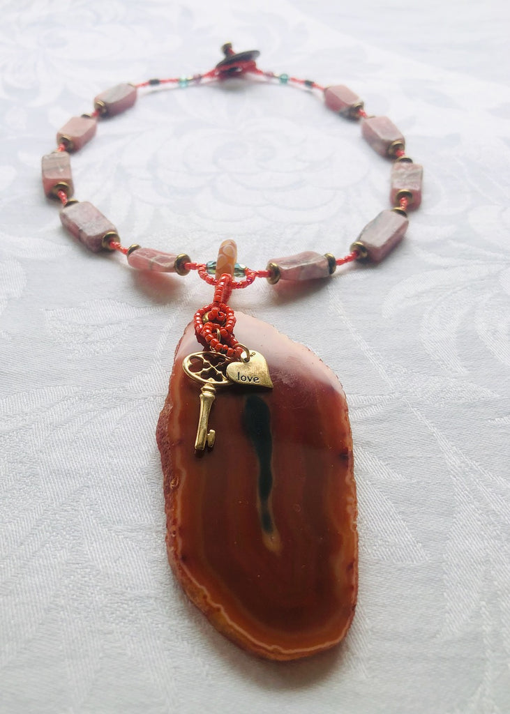 Orange Stone Slice with Charms and Rhodonite Necklace-SugarJewlz Handmade Jewelry